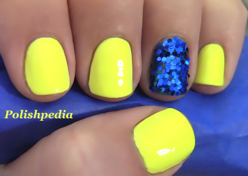 Neon Yellow Nails With a Blue Glitter Accent Nail